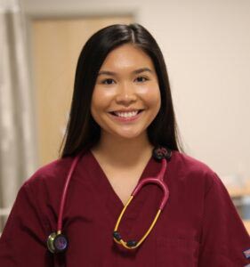nurse standing in hospital room