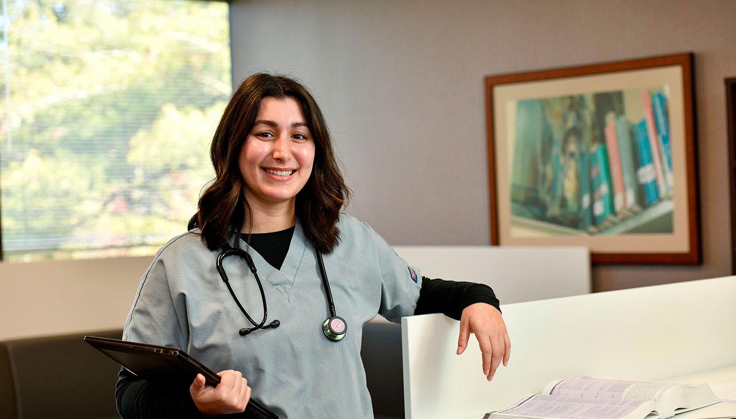 nurse standing at desk